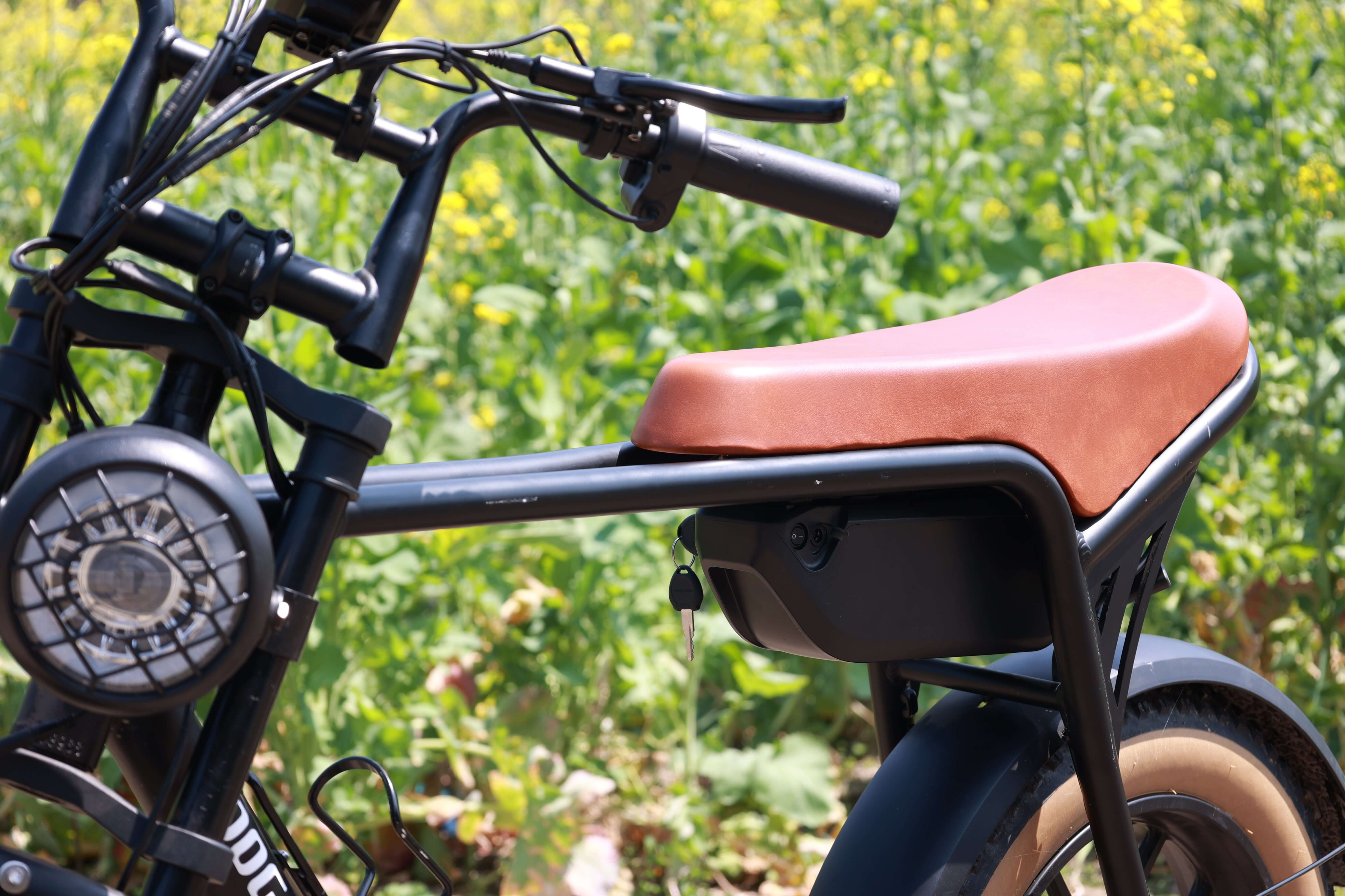close up double seat and light on k3 electric bike